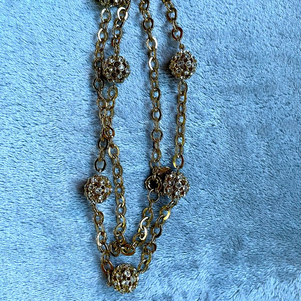 Gold tone/crystal necklace to dress up or down!